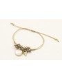 Pulsera hilo dorado palido con colgante disco dora