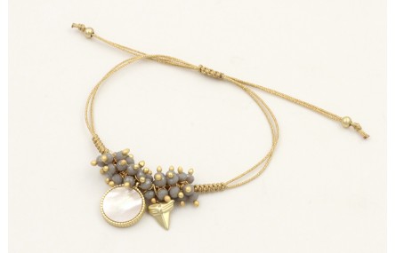 Pulsera hilo dorado palido con colgante disco dora