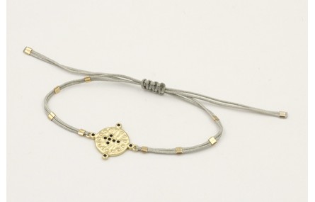Pulsera hilo gris claro con tubitos aplastados y e