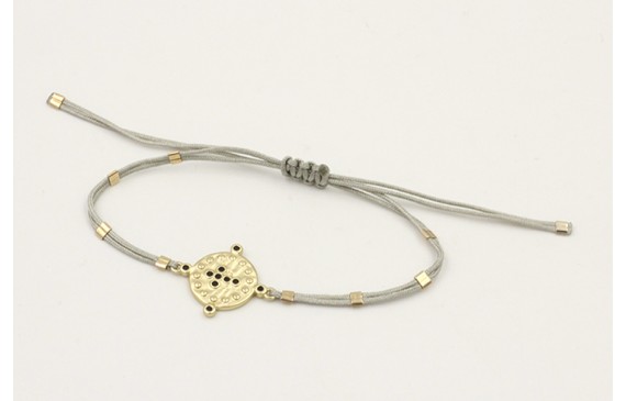 Pulsera hilo gris claro con tubitos aplastados y e