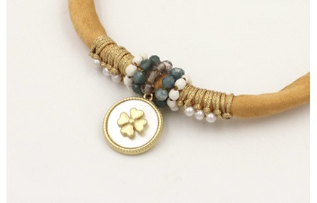 Pulsera seda rellena mostaza con nudo macrame con 