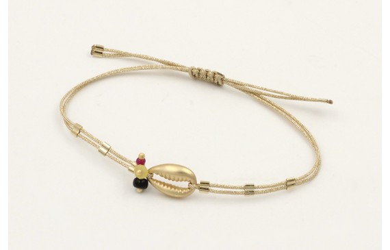 Pulsera hilo dorado palido con tubitos aplastados 