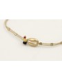 Pulsera hilo dorado palido con tubitos aplastados 