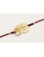 Pulsera de hilo granate con chapa estrella labrada