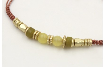 Pulsera hilo macramé oro rosa con rueda estreiada,