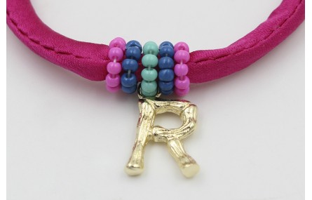 Pulsera seda fucshia con aritos de abalorio rosa,a