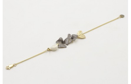 Pulsera eslabón plano dorado mate con caracol esma