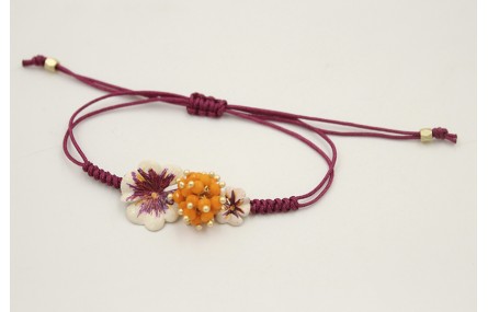 Pulsera hilo granate con nudo serpiente centro tri