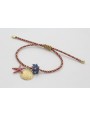 Pulsera de driza rojiza y rosa con concha, estrell
