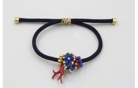 Pulsera de cordón trenzado azul marino con aritos 