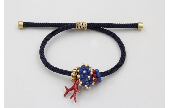 Pulsera de cordón trenzado azul marino con aritos 