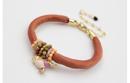 Pulsera de seda rellena color cobrizo con aritos d