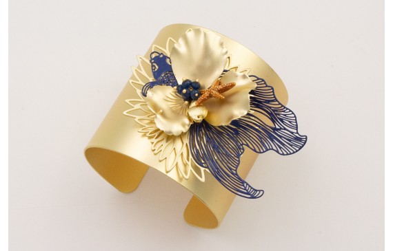 Brazalete rigido flor de loto,pez tropical azul os