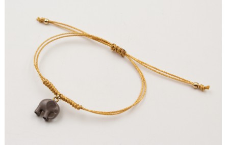 Pulsera hilo metálico dorado con nudo serpiente y 