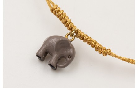 Pulsera hilo metálico dorado con nudo serpiente y 