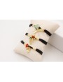 Pulsera seda natural rellena negra con tubo arquea