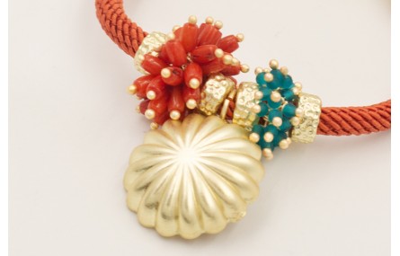 Pulsera cordón trenzado teja con burruños de coral