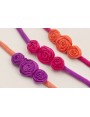 Pulsera seda natural rellena morada con 3  flores 