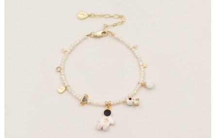 Pulsera astronauta estrelle dorada en el pecho con