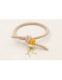 Pulsera goma color beige con burruño facetadas ama