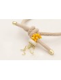 Pulsera goma color beige con burruño facetadas ama