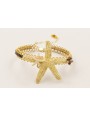 Pulsera rigida labra dorada mate con estrella gran