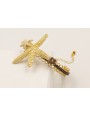 Pulsera rigida labra dorada mate con estrella gran