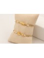 Pulsera ORO18K nudo serpiente hilo metalico dorada