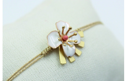 Pulsera nudo serpiente en color oro palido con flo