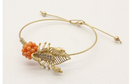 Pulsera rigida con escarabajo de brillos, bola de 