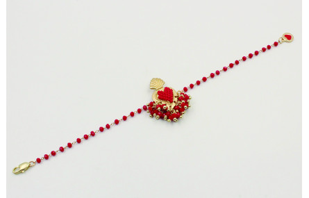 Pulsera cadena facetadas rojas con pieza central s