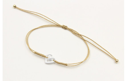 Pulsera nudo serpiente dorado con corazón hueco bl