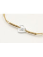 Pulsera nudo serpiente dorado con corazón hueco bl