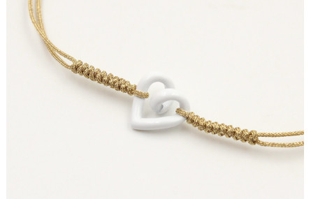 Pulsera nudo serpiente dorado con corazón hueco bl