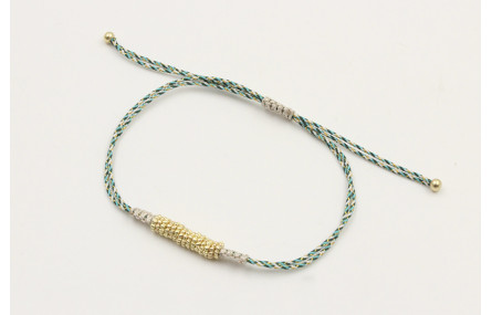 Pulsera macrame azul,gris y oro con nudo macrame p