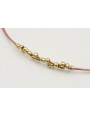 Pulsera hilo microdrusa en oro rosa con abalorio d
