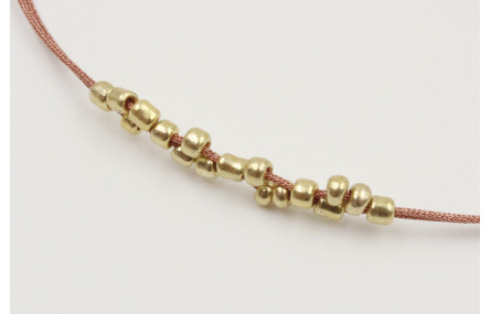 Pulsera hilo microdrusa en oro rosa con abalorio d