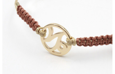 Pulsera hilo macrame oro palido con nudo oro rosa 