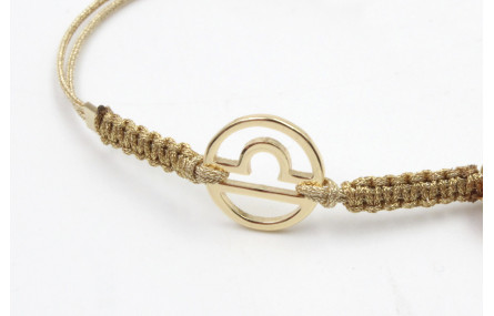 Pulsera hilo macrame oro palido con nudo dorado di