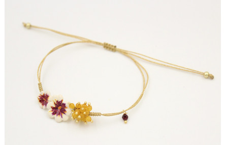 Pulsera nudo serpiente oro pálido con flores esmal