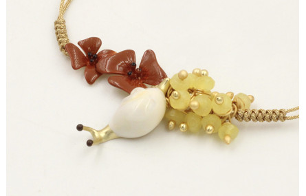 Pulsera hilo dorado pálido con nuedo serpiente, ca