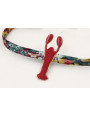 Pulsera lazo liberty azulon con flores rojas,mosta