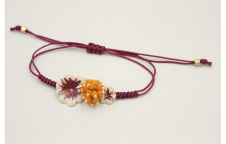 Pulsera hilo granate con nudo serpiente centro tri