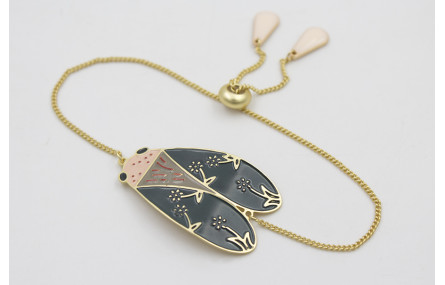 Pulsera cadena eslabón plano dorado mate con polil