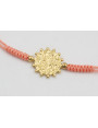 Pulsera  ORO18k-3 micras hilo salmón con nudo serp