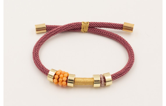 Pulsera cordón retorcido color coral,ruedas dorada