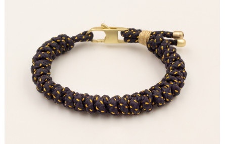 Pulsera cordón azul petróleo con hilo dorado nudo 