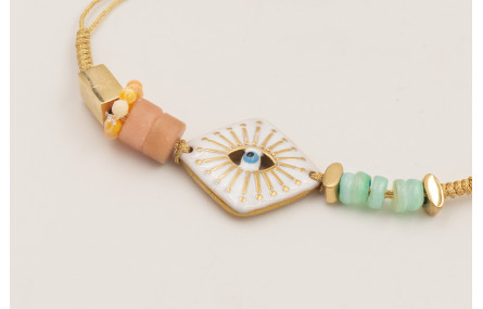 Pulsera de acero inoxidable con hilo dorado nudo s