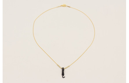 Solitario gato esmalte negro con microcubos dorado