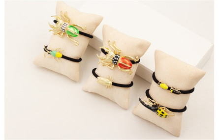 Pulsera cordón retorcido negro con escarabajo esma